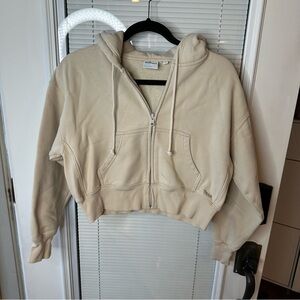 Aritzia TNA Beige Cropped Hoodie
